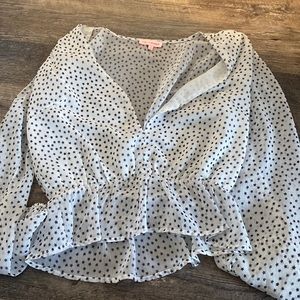 White blouse with blue stars